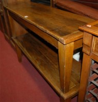 Lot 1224 - A pair of stained elm benches, length 127cm