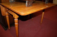Lot 1231 - A Victorian walnut round cornered dropleaf...