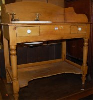 Lot 1233 - A Victorian stained pine two tier wash stand,...