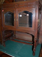 Lot 1238 - An early 20th century low relief carved oak...