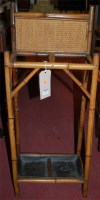 Lot 1257 - An early 20th century stained bamboo twin...