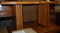 Lot 1269 - An Art Deco figured walnut crossbanded dining...