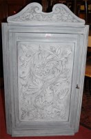 Lot 1270 - A painted low relief floral carved single door...