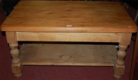 Lot 1306 - A modern pine round cornered low coffee table