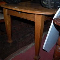 Lot 1315 - An Edwardian oak round cornered extending...