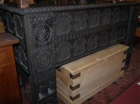 Lot 1337 - A contemporary heavily carved walnut hinge top...