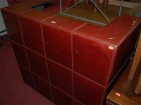 Lot 1299 - A contemporary red leather clad freestanding...