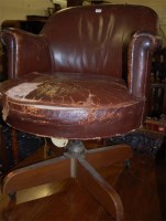 Lot 1345 - An early 20th century oak framed and tan...