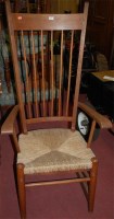 Lot 1350 - An Arts & Crafts oak stickback and rush seat...