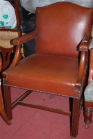 Lot 1351 - A mahogany and tan leather studded upholstered...