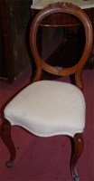 Lot 1354 - A set of four Victorian walnut balloon back...