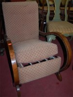 Lot 1369 - A 1930s oak framed open armchair