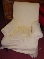 Lot 1384 - An Edwardian upholstered armchair on turned...