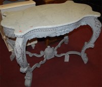 Lot 1387 - A contemporary white variegated marble topped...