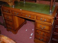 Lot 1393 - A reproduction yew wood and green leather...