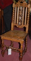 Lot 1394 - An early 20th century low relief carved oak...