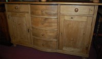 Lot 1400 - A reclaimed pine part bowfront dresser base,...