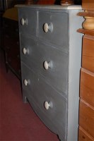 Lot 1414 - A painted pine chest of two short over two...