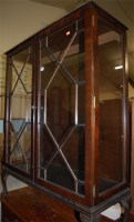 Lot 1423 - A reproduction mahogany double door astragal...
