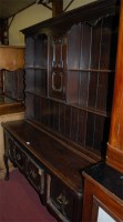 Lot 1430 - A Jacobean style geometric moulded oak dresser,...