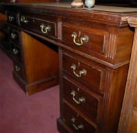 Lot 1441 - An Edwardian mahogany and hide inset twin...