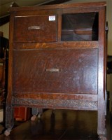 Lot 1282 - A pair of Art Deco oak two drawer bedside...