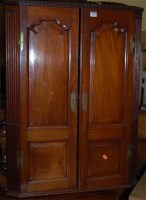 Lot 1281 - A George III walnut double door hanging corner...