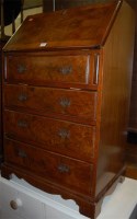 Lot 1388 - A reproduction walnut and figured walnut...