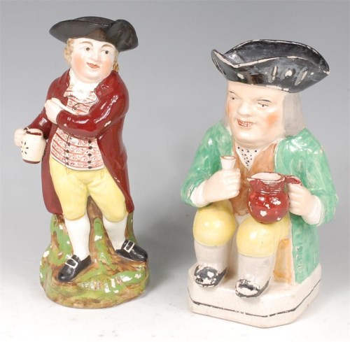 Lot 467 - A 19th century Staffordshire Toby jug,...