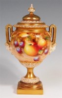 Lot 63 - A Worcester pedestal vase and cover, painted...