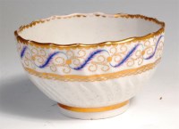 Lot 81 - A Bristol porcelain tea bowl, leaf moulded and...