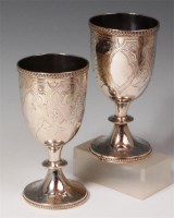 Lot 100 - A pair of mid Victorian silver pedestal...