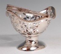 Lot 106 - An Edwardian silver pedestal bonbon basket,...