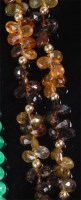 Lot 198 - A faceted multicoloured tourmaline necklace,...