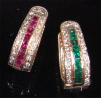 Lot 201 - A pair of contemporary yellow gold ruby,...
