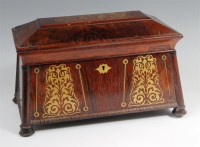 Lot 246 - A late Regency rosewood and brass inlaid tea...