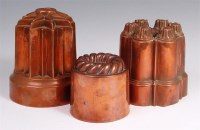 Lot 257 - Three Victorian copper jelly moulds, to...
