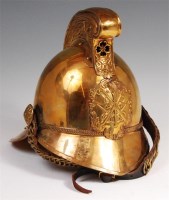 Lot 258 - A brass Merryweather patent fireman's helmet,...