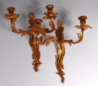 Lot 267 - A pair of Rococo Revival ormolu twin branch...