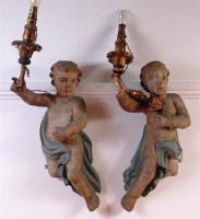 Lot 277 - A pair of Continental carved softwood and...