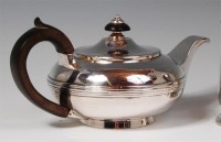Lot 113 - A George III silver bachelors teapot, of squat...