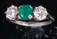 Lot 222 - An Art Deco platinum emerald and diamond dress...