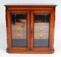 Lot 275 - A circa 1900 oak smokers cabinet, having twin...