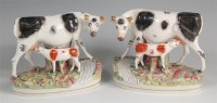 Lot 1154 - A pair of late Victorian Staffordshire groups,...