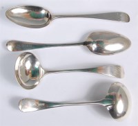 Lot 1194 - A pair of George III silver table spoons, in...