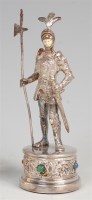 Lot 1198 - A sterling silver figure of a knight, in...