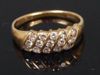 Lot 1240 - A modern ladies 18ct gold and diamond set...