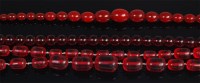 Lot 1248 - A graduated beaded cherry amber single string...