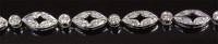 Lot 1288 - A modern 18ct white gold and diamond set...