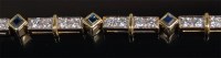 Lot 1289 - A ladies 18ct gold sapphire and diamond set...